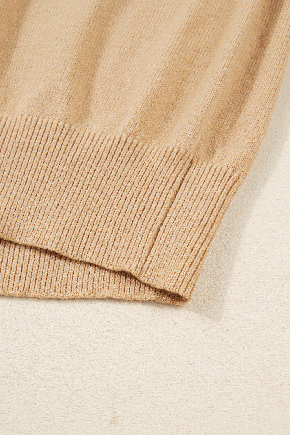 Close up of material of bottom of the sweater