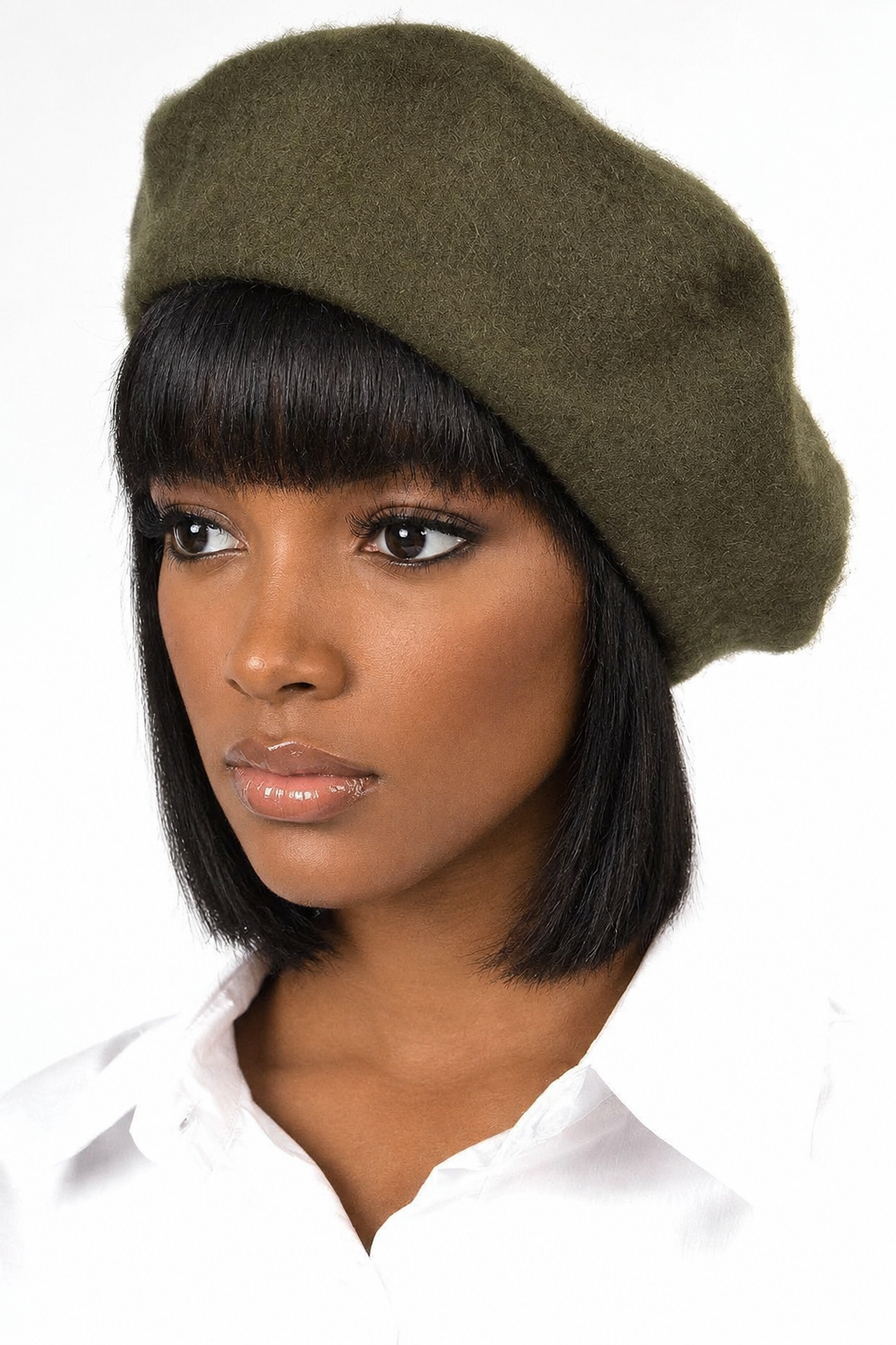 Black woman modeling the fourth beret color