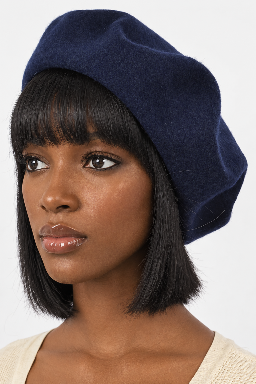 Black woman modeling the navy wool-blend beret