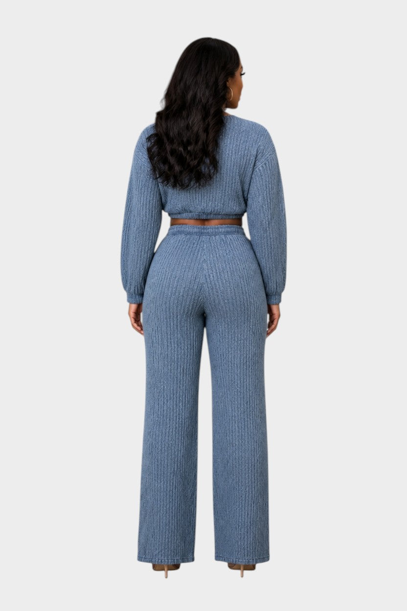 Swerves & Curves Boutique blue denim two-piece set with long-sleeve crop top and wide-leg pants, back view