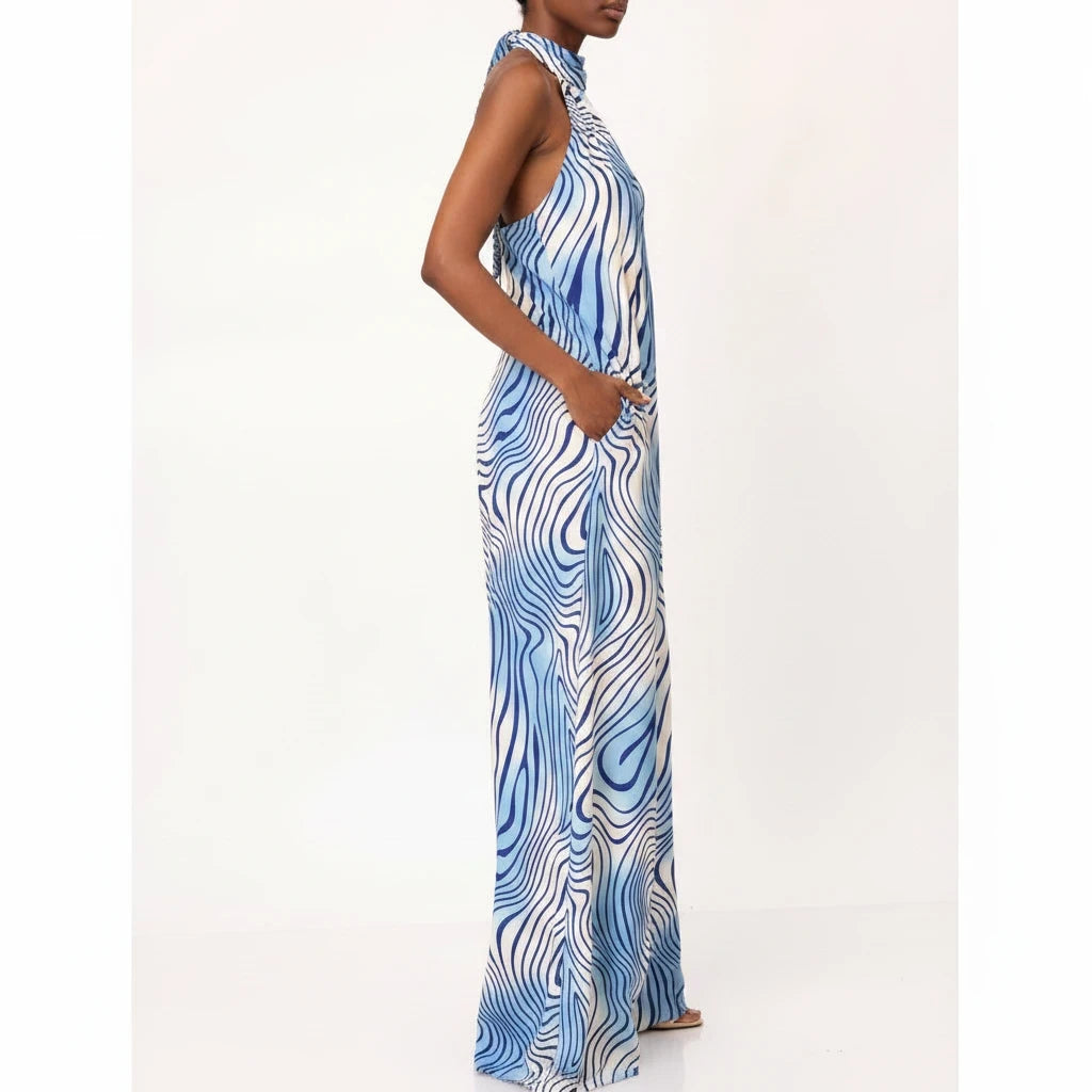 Swerves & Curves Boutique blue and white wave print halter neck backless wide-leg jumpsuit with side pockets