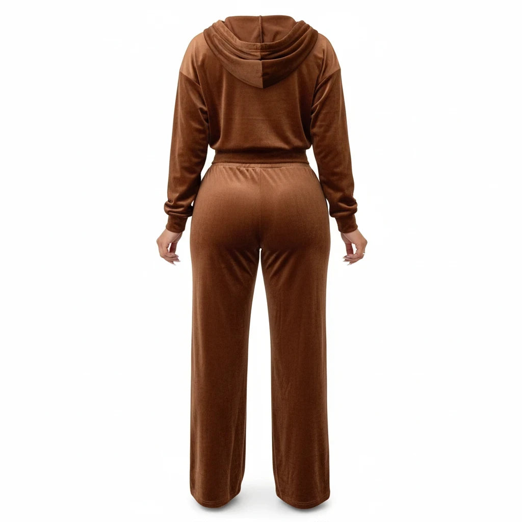Back view of a woman wearing a brown velvet hooded jogging set from Swerves & Curves Boutique