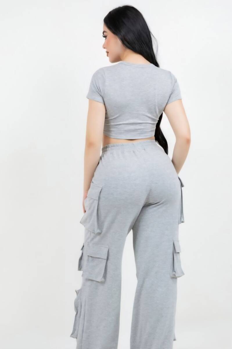 Swerves & Curves Boutique grey cargo set featuring a cropped t-shirt and wide-leg cargo pants on a model, back view.