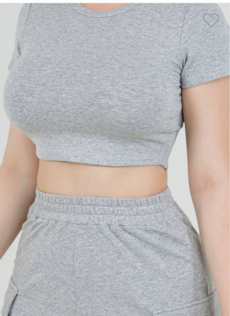 Swerves & Curves Boutique grey crop top and cargo shorts set with a fitted, casual style.