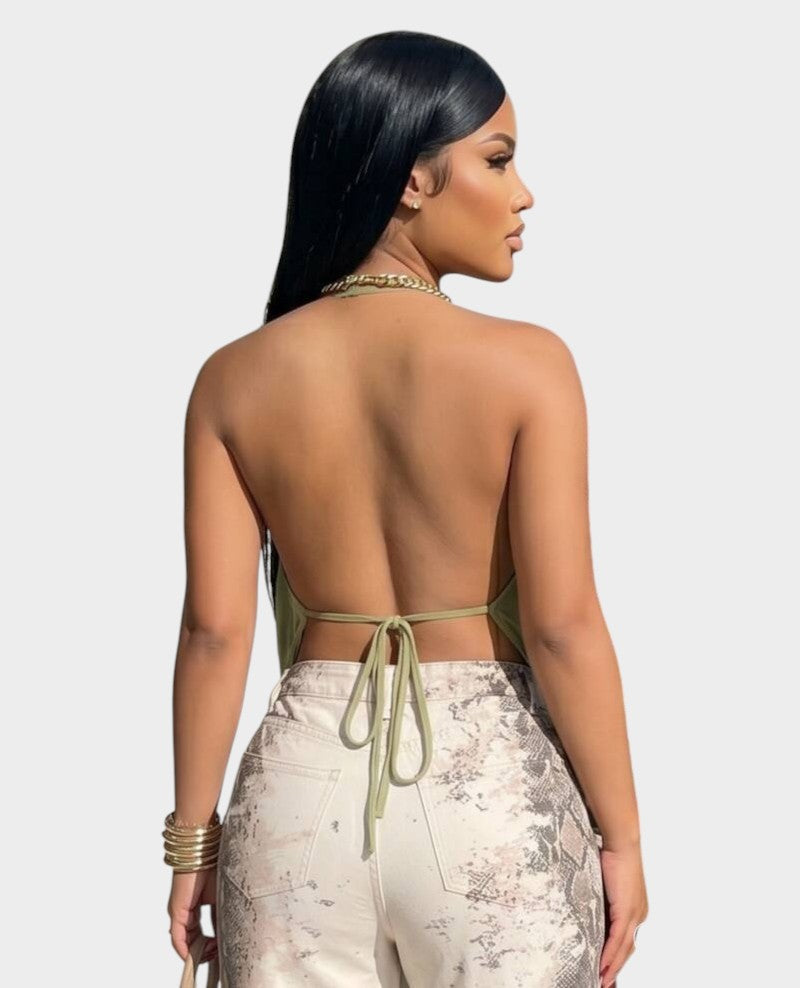 Swerves & Curves Boutique olive green sheer halter top with an open back and tie closure worn by a model