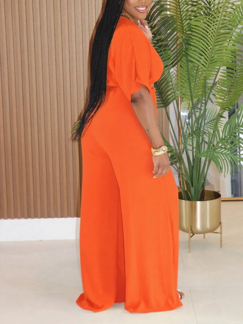 Swerves & Curves Boutique Willow Breeze Set in peach featuring a cropped top and wide-leg pants on a model